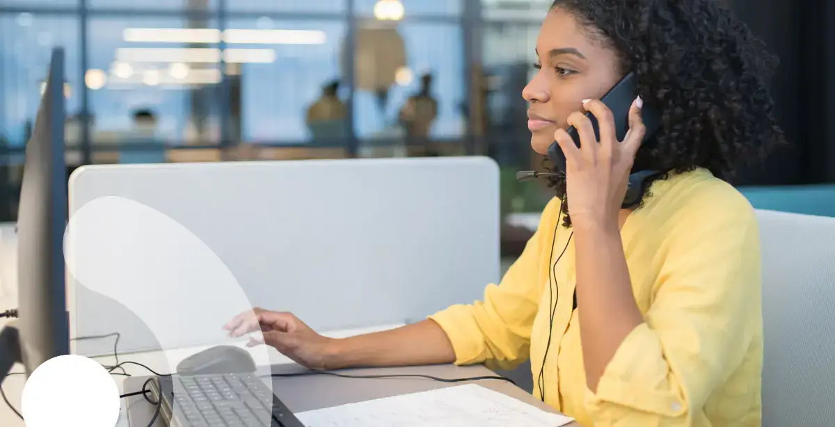 Woman talking on the phone in office setting