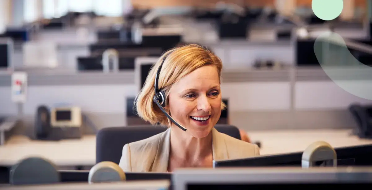 woman with headset in office
