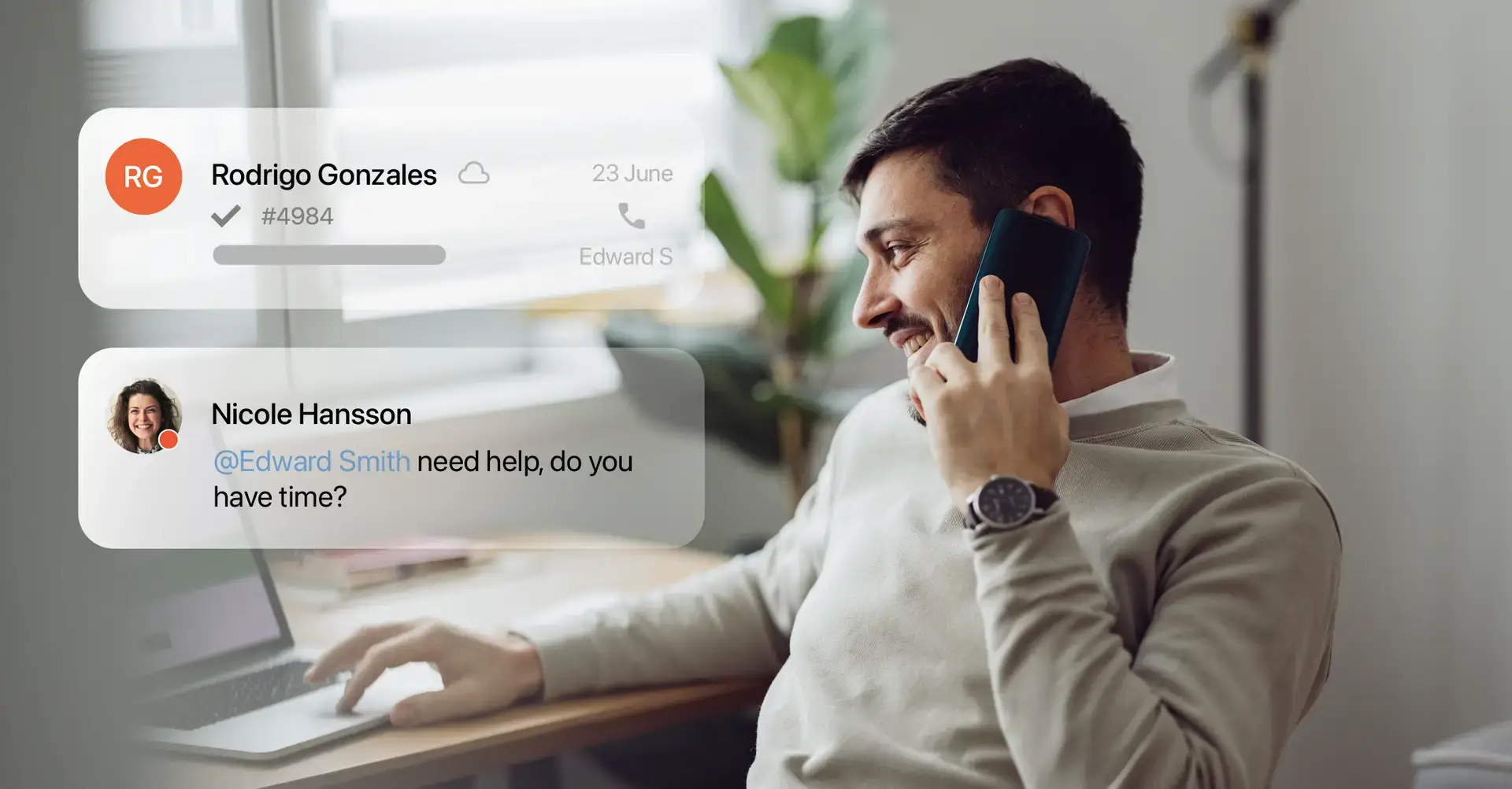 Smiling man talking on the phone while typing on a laptop. Chat widget messages overlaying the photo.
