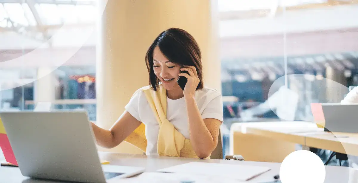 woman talking on the phone in office setting
